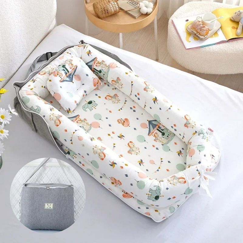 Réducteur de Lit Bébé Pliable - Confort Nomade | TravelNest